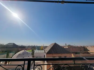 a view of a city from a balcony at amazing home and amazing rooftop in Marrakech