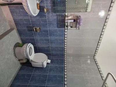 a bathroom with a toilet and a shower at amazing home and amazing rooftop in Marrakech