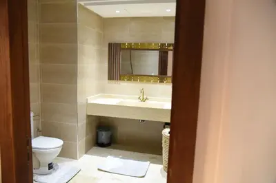 a bathroom with a sink and a toilet at Premium village c1866 in Marrakech