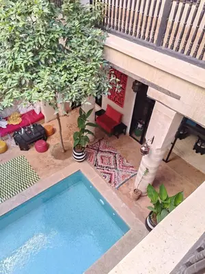an overhead view of a swimming pool in a yard at Riad Palais Bahia - Entire House - 5 Bedrooms in Marrakech