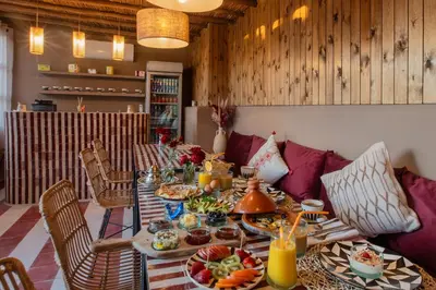 a table with food on it in a room at Riad Tassili Boutique in Marrakech