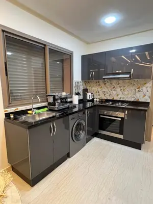 a kitchen with a sink and a dishwasher at T1 Chic & Bright in Marrakech in Marrakech
