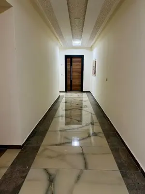 a hallway with a tile floor and a door at T1 Chic & Bright in Marrakech in Marrakech