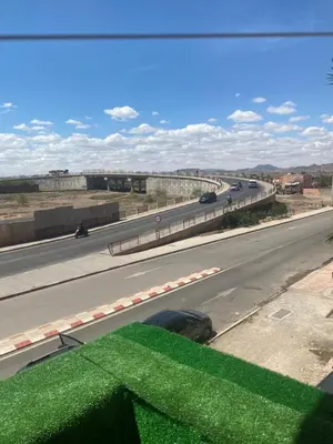 a view of a highway with a car on the road at Modern central apartment 2 bedrooms in Marrakech