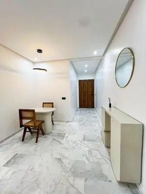 an office with a marble floor and a mirror at Luxe Studio Gueliz in Marrakech