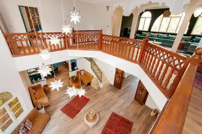 an overhead view of a staircase in a house at Palais Rhize targa in Marrakech