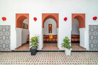 a room with two potted plants in a building at Riad Khadoj-Marrakech-Traditional in Marrakech