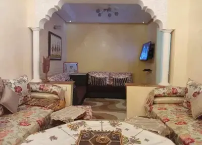 a living room with two couches and a couch at appartement meuble in Marrakech