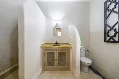 a bathroom with a sink and a toilet at Riad el hana en centre ville rooftop et bassin in Marrakech