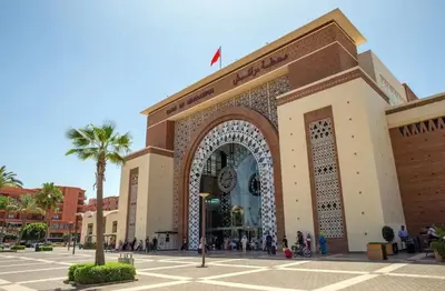 a large building with a clock in front of it at Luxury Aprt 2 bedrooms Pool Hivernage City Centre in Marrakech
