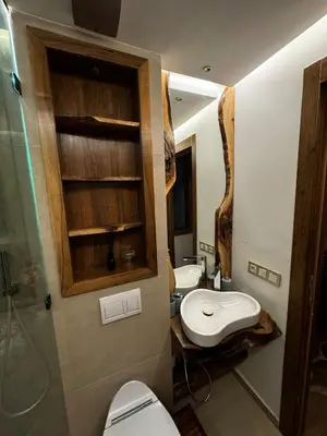 a bathroom with two toilets and a sink at Super duplex in the middle of Marrakech in Marrakech
