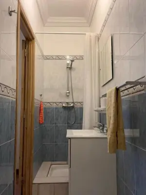 a bathroom with a shower and a sink and a tub at LOGEMENT ENTIER MARRAKECh G4 N41 in Marrakech