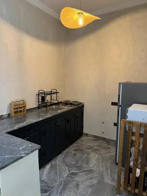 a kitchen with a sink and a counter top at Cozy, Intimate Villa in Marrakech with Heated Swimming Pool Option in Touggana