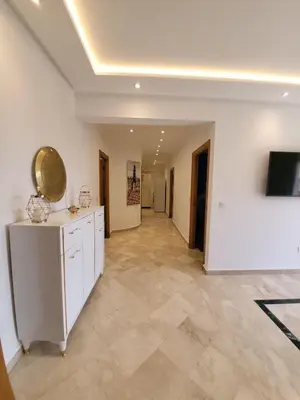 a large room with a kitchen and a living room at Wonderful apartment pool residence Babylon in Marrakech