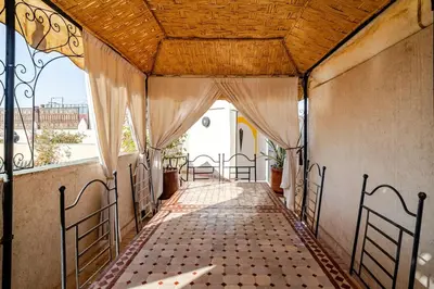 an aisle of a house with a ceiling at superbe riad en exclusivité B&B in Marrakech