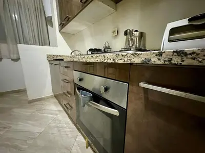 a kitchen with a sink and a dishwasher at Comfort and Charm in Marrakech 6 min from Gueliz in Marrakech
