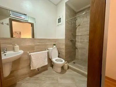 a bathroom with a toilet and a sink and a shower at Comfort and Charm in Marrakech 6 min from Gueliz in Marrakech