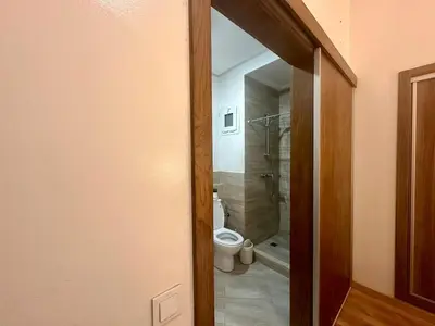 a bathroom with a toilet and a walk in shower at Comfort and Charm in Marrakech 6 min from Gueliz in Marrakech