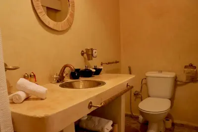 a bathroom with a sink and a toilet at Riad Chez moi in Marrakech
