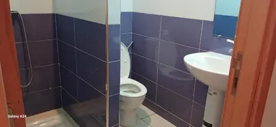 a bathroom with a toilet and a sink at Horizon Sérénité in Marrakech
