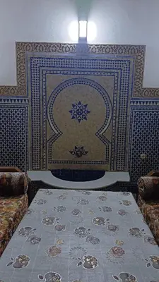 a room with a rug on a wall with a floor at Marrakech Maroc Guiliz in Marrakech