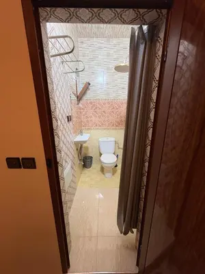 a bathroom with a toilet and a sink at Daryussef 114 in Marrakech