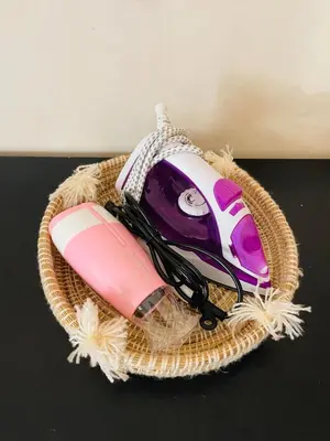 a hello kitty phone in a wicker basket at chic nest heart of gueliz With pool in Marrakech