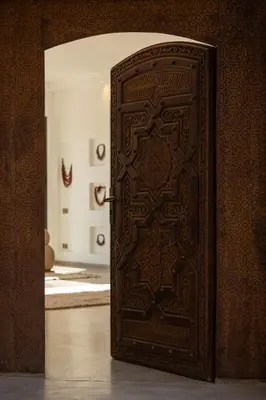 an open wooden door in a room at Villa Yliane in Marrakech