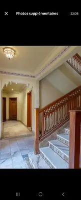 an empty room with stairs and a stair case at Marrakech Palmeraie 2 appartement 3 ch 7 pers résidence avec piscine in Marrakech
