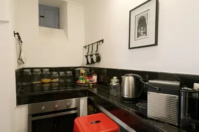 a kitchen with a black counter top at mon riad in Marrakech