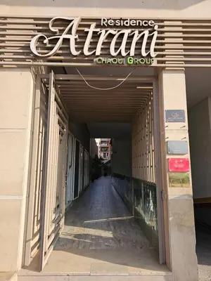 an entrance to a store with a sign on it at Apparemment haut de gamme à l'hivernage in Marrakech