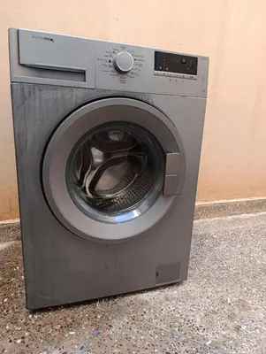 a washing machine sitting next to a wall at Marrakech welcome in Marrakech