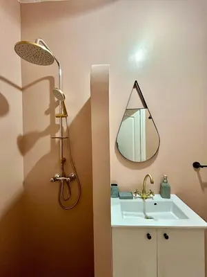 a bathroom with a sink and a mirror on the wall at Dar Mimouna - Authenticité & Confort Moderne in Marrakech