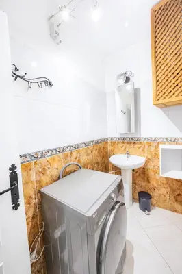 a bathroom with a toilet and a sink at Luxe Studio 2min Carre Eden in Marrakech