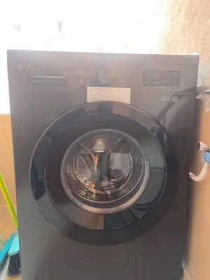 a washing machine with its door open in a room at Cozy Apartment With Pool 5 min from Guéliz in Marrakech