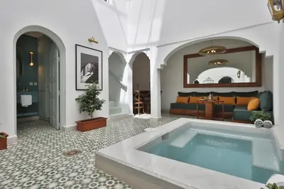 a living room with a large tub in the middle at DeaRiad, Medina, Basin, 2 Bedrooms in Marrakech