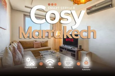 a poster of a living room with a couch and a tv at Logement entier Appartement Cosy - Marrakech in Marrakech