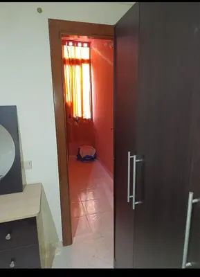 an open door to a room with a hallway at Magnifique appartement in Marrakech