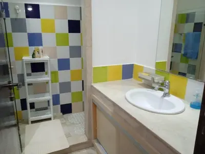 a bathroom with a sink and a shower at Cosy and spacious apartment in Gueliz in Marrakech