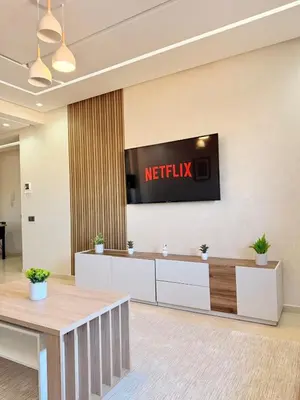 a waiting room with a netflix sign on the wall at Appartement au cœur de Marrakech in Marrakech
