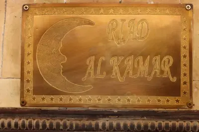 a sign that says no almanac on a wall at Riad Al Kamar, private, 2 min from Jema El Fna Square in Marrakech