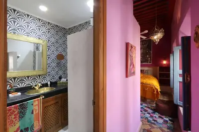 a bathroom with a sink and a mirror at Riad Al Kamar, private, 2 min from Jema El Fna Square in Marrakech