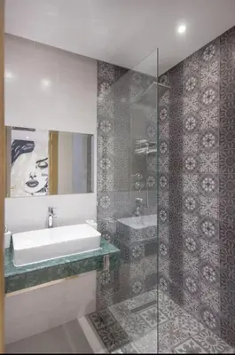 a bathroom with a sink and a bath tub at Urban Chic 2 bedrooms in Utimate City Center in Marrakech