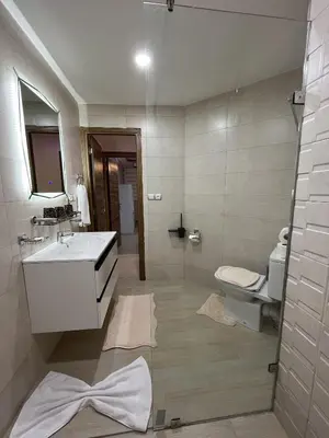 a bathroom with a sink and a toilet at Marrakech l'aéroport in Marrakech