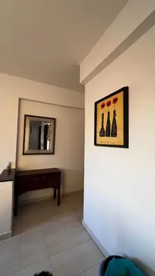 a room with a mirror and a piano on a wall at Bright with great view in Marrakech