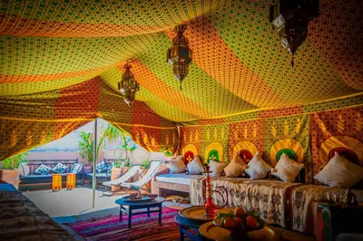 a room with a tent with beds in it at Riad Dar Mamouni in Marrakech