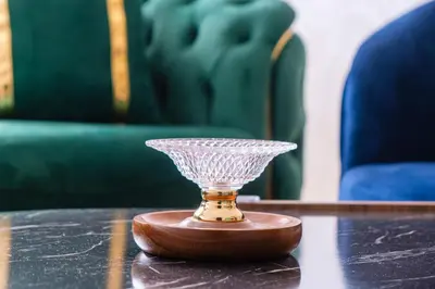 a glass trophy sitting on a table in a room at 2BR Modern Apt 2min M Avenue Balcony Fiber WiFi 2 Pools 24 7 Security Hivernage in Marrakech