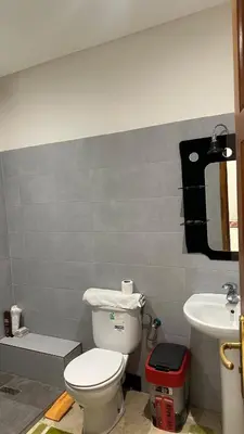 a bathroom with a toilet and a sink at Top apartment Great location in Marrakech