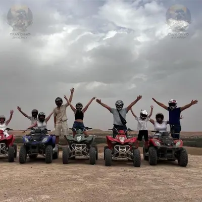 a group of people standing in four wheeled vehicles at Quad Alia Marrakech in Marrakech