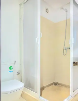 a bathroom with a shower and a toilet at Residence Jnan atlas gueliz in Marrakech